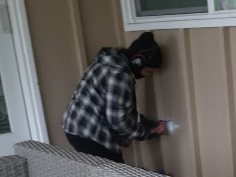 Professional electrician installing an exterior outlet in South Bay